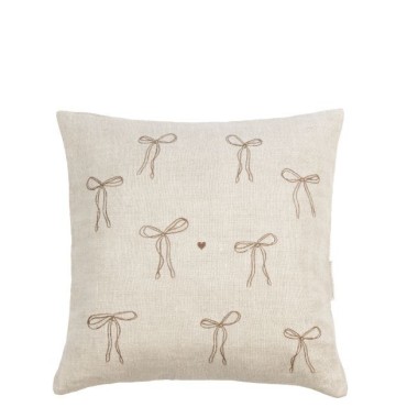 Housse de coussin beige avec des nœuds