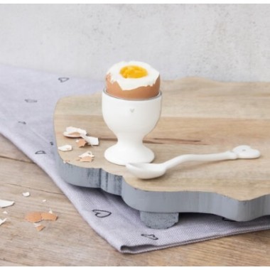 Coquetier blanc avec le cœur gris