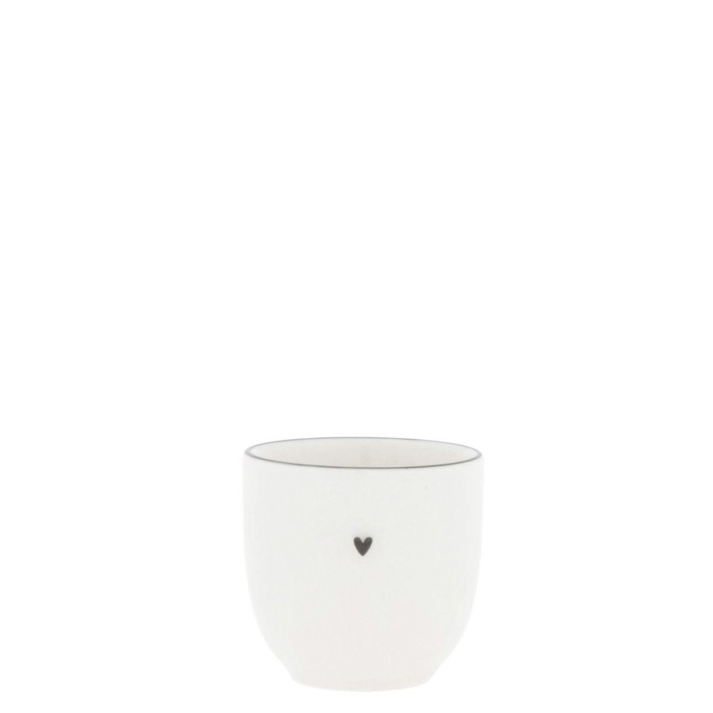 Coquetier blanc avec le cœur noir